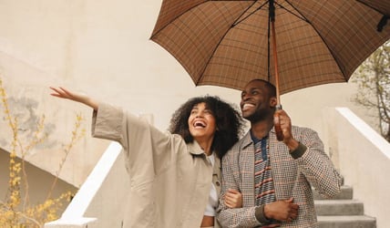 Couple Celebrating after consolidating debt 